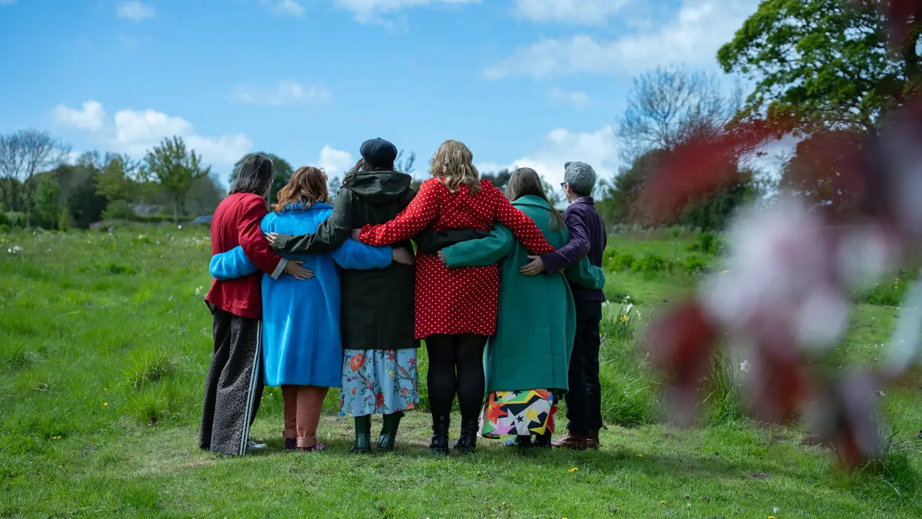 A group of women standing together outdoors